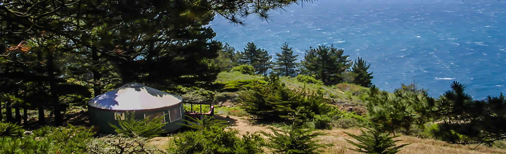 Yurt on a hillside overlooking the ocean